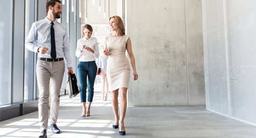 professionals walking in hallway